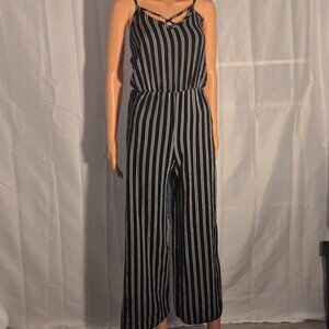 Jumpsuit by See you Monday. sleeveless. Black & white stripes, size Large